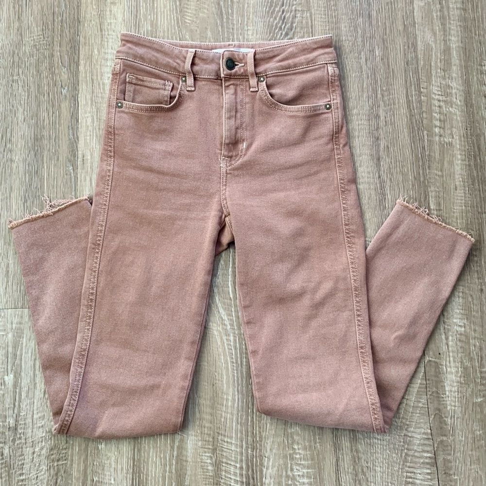 We the Free raw hem mid rise jeans